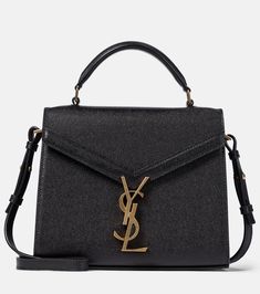 Cassandra Mini leather shoulder bag in black - Saint Laurent | Mytheresa Evening Tan Satchel With Branded Hardware, Tan Satchel With Branded Hardware For Evening, Aesthetic Shop, Saint Laurent Bag, Mini Shoulder Bag, Travel Accessories, Leather Shoulder Bag, Calf Leather, Designing Women