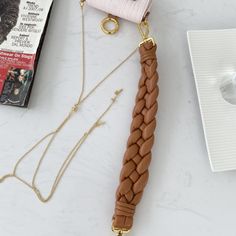 Description FND Nano Baguette Maxi Handle Pink and Brown Bag For Woman 6.5cm/2.5in Rep 1:1 Size: 6.5 x 2.5 x 11 cm / 2.5 x 1 x 4 inch Nano version of the iconic Baguette bag, with flap and oversized FF fastening with magnetic clasp. The clip allows it to be attached to larger bags or belts. It can also be worn cross-body thanks to the fine chain adjustable shoulder strap. Credit card holder flat pocket inside. Made of pale pink leather. Oversized woven nappa leather handle. Gold-finish metalware Pink And Brown, Brown Bag, Luxury Bag, Baguette Bag, Brown Bags, Credit Card Holder, Large Bag, Magnetic Clasp, Nappa Leather