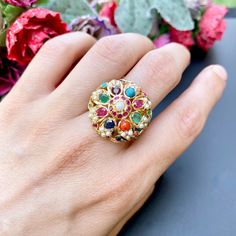 Featuring a mid size navratan ring in 22ct gold. The ring is adjustable and weighs 11.8 GMs The same design custom made in 925 Sterling Silver with Gold Plating will cost ~ USD 130 Price Breakup Summary Component Rupees % of Total 22k Gold 54,384 73.0% Stones & Beads 8,184 11.0% Making Charges 9,789 13.1% Taxes (GST) 2,171 3.0% Total 74,528 100.0% View Detailed Price Breakup Watch Video Here Navratan Rings For Women, Traditional Multi-stone Oval Rings, Traditional Oval Multi-stone Rings, Traditional Multicolor Rings For Gifts, Traditional Multicolor Rings As Gift, Navratan Ring, Navratan Jewellery, Jadau Jwellery, 22k Gold Jewelry Necklaces