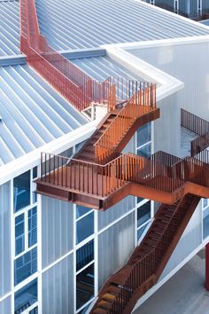 an overhead view of a building with wooden stairs