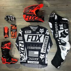 the fox racing gear is laid out on the floor