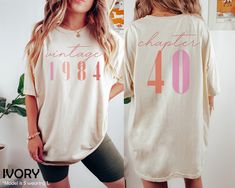 "Classic 1984 Shirts For Women, Vintage 40th Birthday Year Number Tshirt For Him, 40th Milestone Best Friend Bday Gift For Her, 40 Bday Shirt HOW TO ORDER ➀ Select color ➁ Select the size (Please check size chart) ✦ True to size. Size up 1-2 sizes for an oversized look. ➂ Add to cart ✦ (Optional) \"Add message to Seller\" on the checkout page. GARMENT FEATURES ✦ Crew neckline ✦ Direct to garment printing - no vinyl, decal, or iron-on technique ✦ Our designs are printed on the garment to last a l Turning 40 Shirts, 40tg Birthday Ideas For Women, 40th Party Ideas For Women, Fun 40th Birthday Ideas For Women, 40th Birthday Themes For Women, 40th Birthday Party For Women, 1984 Shirt, Bday Shirt, 40th Birthday Shirts