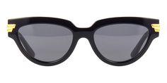 BOTTEGA VENETA BV1035S 001This cat eye Bottega Veneta sunglass comes in a black frame with grey lenses.About Bottega Veneta:Since its establishment in the Veneto region of Italy in 1966, Bottega Veneta has been synonymous with a new standard of luxury. Rooted in the rich traditions of Italian master craftsmen, the brand's ethos revolves around discretion, quality, and unsurpassed craftsmanship. Each piece created by Bottega Veneta's artisans is a testament to their extreme attention to detail, h Classic Black Cat Eye Sunglasses With Uva Protection, Classic Black Cat Eye Sunglasses With Mirrored Lenses, Classic Black Cat Eye Sunglasses, Formal Black Cat Eye Sunglasses With Uva Protection, Matte Black Cat Eye Sunglasses For Evening, Black Cat Eye Sunglasses With Uva Protection, Black Wayfarer Sunglasses For Evening, Matte Black Sunglasses With Mirrored Lenses For Evening, Elegant Matte Black Shield Sunglasses With Tinted Lenses