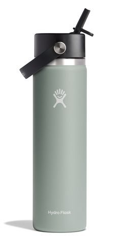 the hydro flask water bottle has a black lid and is in front of a white background