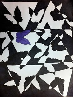 a piece of paper with black and white designs on it