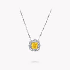 The exquisitely feminine hue of a cushion cut Fancy Yellow diamond is enhanced by a delicate halo of pavé white diamonds in our Icon pendant in yellow gold and white gold. Radiating pure joy, the bewitching design showcases Graff's expertise in crafting yellow diamond jewels that capture the eye and the heart. With a legacy of cutting and polishing many of the world’s most fabulous yellow stones, Graff has an enduring affinity for yellow diamonds, which have become synonymous with the House. Dis Yellow Diamond Pendant, Yellow Diamond Jewelry, Graff Jewelry, Diamond Shaped Engagement Ring, White Diamond Jewelry, Round Diamond Earrings, Diamond Earrings Studs Round, Yellow Diamonds, Fancy Yellow Diamond