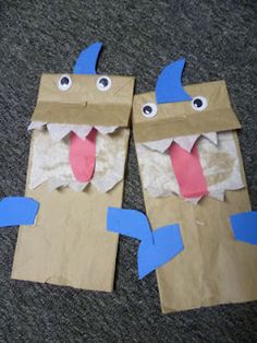 two paper bags that have been made to look like monsters