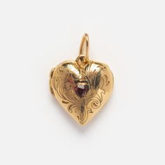 Solid Gold Locket Charm | Local Eclectic Victorian Locket Jewelry For Valentine's Day, Victorian Locket For Valentine's Day, Valentine's Day Fine Jewelry Locket, Fine Jewelry Heart-shaped Locket, Fine Jewelry Heart Locket, Victorian Jewelry With Heart Charm For Keepsake, Victorian Jewelry With Heart Charm As Keepsake, Antique Heart-shaped Yellow Gold Jewelry, Fine Heart-shaped Locket Jewelry