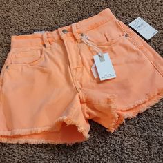 Good American 90s Shorts High Rise Nwt / No Flaws Runs Big! Stretchy Neon Coral /Orange Cream *Color Won't Show Up In Pictures Accurately. It Is Much More Of A Neon Coral Color Than What It Looks Like Online. One If My Favorite Colors! These Shorts Are Amazing I Just Need To Go Down 2 Sizes In These And I Cant Return Them As They're Final Sale Size 00 Measures: Waist 26" But Stretches To 28" 10.25" Rise 38" Hip 24" Thigh 3.25" Inseam Size 2/26 Measures: Waist 31" Unstretched But Easily Stretches Orange Cotton Shorts, Orange Relaxed Fit Shorts For Spring, Trendy Orange Cotton Shorts, Orange Cotton Shorts For Spring, Spring Orange Cotton Shorts, Casual Orange Bottoms With Built-in Shorts, Summer Orange Shorts With Pockets, Orange Summer Shorts With Pockets, Orange Shorts With Pockets For Spring