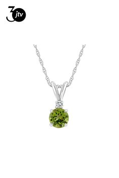 5mm round peridot with diamond accent rhodium over 14k white gold pendant with 18" rope chain. Measures approximately 0.54" L x 0.20" W. Spring ring clasp. White Gold Peridot Jewelry With Birthstone, Fine Jewelry With Round Cut Peridot, White Gold Peridot Jewelry For May Birthstone, Green Round Birthstone Necklace In Fine Jewelry Style, Classic Peridot Jewelry With Brilliant Cut, White Gold Peridot Jewelry With Prong Setting, White Gold Peridot Round Cut Jewelry, White Gold Round May Birthstone Necklace, White Gold Round Necklace For May Birthstone