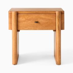 a small wooden table with one drawer open