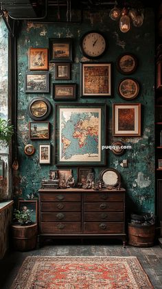 a room filled with lots of framed pictures and clocks on the wall above a dresser