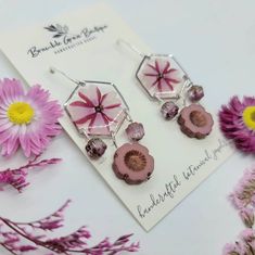 Handmade earrings made with preserved real beautiful pink verbena flowers in high quality resin. Attached with unique pink Czech beads and nickel free earring hooks. Nickel-free Botanical Flower Earrings, Heather Flower, Silver Bead Earrings, Nickel Free Earrings, Daisy Earrings, Botanical Jewelry, Floral Earrings, Czech Beads, Garden Gifts