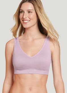 The Jockey® Molded Cup Seamfree Bralette has everything you want in a bra and more: Soft, sewn-in, wire-free molded cups to enhance your natural shape. (Bonus: no pads to remove for washing!) Extra back and side smoothing for a sleek fit under your favorite tops. Wide, hardware-free straps and underband lend comfortable support with no pinching or digging. Silky, stretchy, breath-ahh-ble knit fabric. Perfect coverage and comfort it s the bra(lette) you ll wear all day, every day! | Jockey® Molde Fitted Full Coverage Top With Soft Touch, Full Coverage Fitted Top With Soft Touch, Fitted Tops With Soft Touch, Stretch Bra With Soft Touch, V-neck Stretch Bra With Soft Touch, Comfortable Stretch Tops Bra Friendly, Soft Touch Stretch Tops For Relaxation, Seamless Full Coverage Tops For Loungewear, Seamless Full Coverage Loungewear Tops