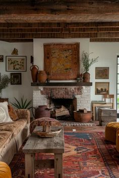 a living room filled with furniture and a fire place