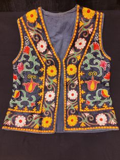 Vintage Uzbekistan Embroidered Vest. All embroidered with Silk and linking cotton. Size; Height 60cm / Armpit 49cm / Skirt 53 cm and Shoulder left to right from top 39cm. Traditional Embroidered Fabric With Motif, Traditional Embroidered Fabric For Spring, Multicolor Embroidered Folk Fabric, Folk Style Floral Embroidered Fabric For Festivals, Folk Style Multicolor Geometric Embroidered Fabric, Surface Pattern Design Inspiration, Vintage Fireplace, Embroidered Vest, Pattern Design Inspiration