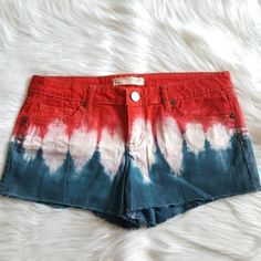 Size 11 Juniors Shorts In Tie Dye Red, White, And Blue. 5 Pockets. Frayed Edges. Perfect 4th Of July, Patriotic Shorts. New Without Tags Flat Lay Measurements: 16" Waist And 2.5" Inseam Red Cotton Bottoms With Built-in Shorts, Trendy Red Cotton Shorts, Blue Bottoms For 4th Of July, Short Length, Red Cotton Beach Bottoms, Red High-waisted Cotton Shorts, Blue Short Length Bottoms For 4th Of July, Red Shorts For Beach On 4th Of July, Trendy Red Cotton Jean Shorts, Fitted Red Jean Shorts