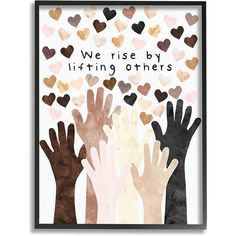 some hands are in the air with hearts flying out of them and we rise by lifting others