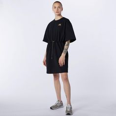 Embrace Effortless Style With The Nb Athletics Tee Dress. Made From Soft Heavyweight Cotton Jersey Fabric With A Relaxed Fit That Drapes Comfortably On The Body, This Women’s Dress Is Destined To Become A Wardrobe Staple. A Cinch Draw Cord At The Waist Lets You Adjust The Fit For Comfort And Style And A Stacked Logo On The Chest Adds A Fun, Sporty Look. Size Medium (Oversized) Brand New With Tags! Retails $92 Black T-shirt Dress For Loungewear, Casual Black T-shirt Dress For Loungewear, Casual Black Streetwear Dress, Casual Black T-shirt Dress, Casual Crew Neck Dress For Streetwear, Casual Crew Neck Dresses For Streetwear, Black Oversized Crew Neck T-shirt Dress, Oversized Black Crew Neck T-shirt Dress, White Tennis Dress