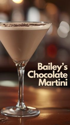 bailey's chocolate martini in a coupe glass on a bar with the title bailey's chocolate martini