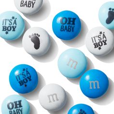 it's a boy and its a baby candy candies arranged on white background