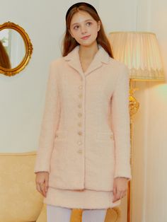 Editor's Notes The jacket is made with soft, fuzzy wool in pastel colors to create the mood of a cotton candy. - Fleeced fabric- Cute buttons as accents- Slim fit to wear as a coat Measurements(in.)34 / 36- Length: 26.77 in. / 27.36 in. - Shoulder: 14.96 in. / 15.35 in. - Chest: 19.29 in. / 20.28 in. - Bottom Hem: 15.55 in. / 16.54 in. - Sleeve Width: 6.69 in. / 7.09 in. - Sleeve Length: 22.83 in. / 23.23 in. Model info: Height 5' 7'', 55 size, Fitting size 34 / Height 5' 7'' Pink Long Sleeve Wool Blazer, Pink Wool Single Breasted Blazer, Pink Wool Blazer For Winter, Winter Pink Wool Blazer, Feminine Winter Outerwear With Button Closure, Feminine Pink Outerwear With Button Closure, Feminine Long Sleeve Winter Blazer, Pastel Long Sleeve Outerwear For Fall, Feminine Pink Outerwear With Buttons