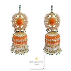 Indulge in the regal allure of vintage Rajputana jewellery with our custom-made Coral Gemstone and Moissanite Polki Jhumka Earrings. Inspired by the opulence of bygone eras, these statement earrings exude timeless elegance. Crafted with semi-precious coral and shimmering polki gemstones, each piece is meticulously cut and set onto a genuine silver base, finished with an exquisite 18k gold polish. Offering an ethical alternative to real sea coral jewellery, these earrings radiate luxury without c Fusion Style Earrings For Diwali, Fusion Kundan Earrings With Latkans, Sterling Silver Jhumkas For Wedding And Festivals, Fusion Style Chandbali Earrings For Ceremonies, Fusion Style Chandbali Earrings For Ceremonial Occasions, Heavy White Fusion Style Jhumkas, Festive Fusion Style Ceremonial Earrings, Authentic Kundan Earrings For Celebration, Bollywood Style Kundan Jhumkas With Hallmark