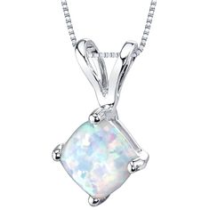 A little bit of whimsy. A little bit of confetti Our Opals are a multi-dimensional experience filled with joyful specs of confetti and a dash of whimsy.  This graceful pendant features cushion cut Peora created Opal gemstones in 14K white gold. Responsibly sourced in every sense, our created Opal gemstones are physically, chemically, and optically identical to their natural counterparts. We're big fans of eco-luxury. Handcrafted in pure 14K white gold goodness, this pendant has been carefully coated in an elegant rhodium finish. Our artisans are expertly trained in this process which fortifies the pendant's strength, shine and brilliance. Main Stone Lab Created Opal 0.5 Carats, cushion cut, 6 x 6 mm White color with a SI1-SI2 clarity Metal 14K White Gold 14K stamp, 0.58 grams Sizing Pendan Gold Cushions, Opal Pendant Necklace, Dainty Gold Necklace, White Necklace, Special Jewelry, Opal Pendants, Opal Necklace, White Opal, Opal Jewelry