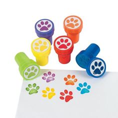 four stampers with paw prints on them and the price is $ 3 95 each