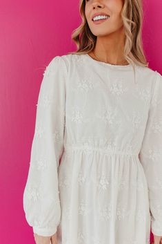 Stay sweet and cute in THE WINNEE MAXI EYELET DRESS. With a charming eyelet design and convenient pockets, this long sleeve dress is perfect for any occasion. Embrace the pure white color and effortlessly stand out in style. Long Sleeve Eyelet Temple Friendly Maxi length Pockets Self: 100% rayon, Lining: 100% polyester Dress is true to size. Small (0-2), Medium (4-6), Large (8-10), X-Large (10-12). Length (shoulder to hem): Small: 55.5", Medium: 56", Large: 56.5", X-Large: 57". Model is 5'5" wea White Dress Long Sleeve Casual, Winter White Dresses Long Sleeve, Lds Temple Dress, Temple Dresses, White Dress Winter, Temple Dress, Indoor Wedding Ceremonies, Modest Clothes, Nature Dress