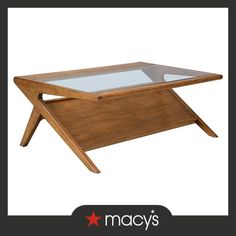 a coffee table with glass top and wooden frame on the bottom, in front of a white background