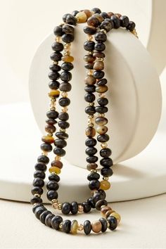 Wear it long or wear it wrapped, this beaded beauty will steal the show. A trio of natural buffalo horn, glass crystal and gold-plated beads create this ultra-versatile necklace that's sure to make a statement wherever you wear it. So go ahead, shift into neutral. Soft Surroundings, Glass Crystal, Go Ahead, Crystal Glass, Horn, Buffalo, Beaded Jewelry, Beaded Necklace, Plating