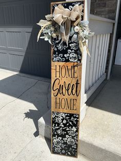 a wooden sign that says home sweet home