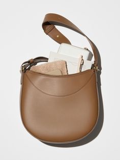 Faux Leather One-Handle Bag | UNIQLO US Modern Saddle Bag With Large Capacity For Daily Use, Modern Large Capacity Saddle Bag For Daily Use, Handheld Saddle Bag With Removable Pouch For Everyday, Modern Beige Saddle Bag For Daily Use, Modern Saddle Bag For Daily Use, Modern Saddle Bag With Removable Pouch For Daily Use, Modern Brown Saddle Bag For Daily Use, Modern Saddle Tote Bag For Daily Use, Modern Beige Saddle Bag For Everyday