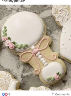 decorated cookies are sitting on a table