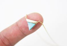 Lovely and tiny gold framed turquoise marble stone triangle pendant necklace is great to wear for everyday or special occasions . Materials Gold plated Turquoise stone Size Charm size : 10 mm Chain Length : 16 '' ( AS PICTURED ) You can CHOOSE your chain length 15 - 18 INCHES before check out ! * necklace sizes * 15 inches: around neck 16 inches: standard short 17 inches: average length 18 inches: standard long CAUTION - We do not recommend to buy it if you have allergic and sensitive skin - Do Dainty Triangle Jewelry Gift, Dainty Triangle Jewelry For Gifts, Turquoise Triangle Jewelry Gift, Turquoise Triangle Jewelry For Gifts, Turquoise Marble, Modern Necklace, Triangle Pendant, Necklace Simple, Marble Stone