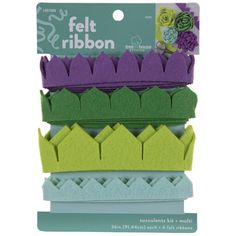 five pieces of felt ribbon in various colors and shapes, with flowers on each side