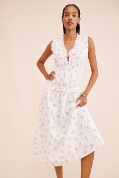 Rent Dion Floral Smocked Midi Dress from Nuuly. Pick 6 items for $98/month. Free shipping + returns. Spring Gatherings Ruched Midi Dress, Casual Dresses For Spring Gatherings, Feminine Smock Midi Dress For Spring, Spring Dresses With Gathered Waist For Gatherings, Spring Dresses For Gatherings With Gathered Waist, Spring Midi Dress For Gatherings, Casual Ruched Smocked Dress For Gatherings, Spring Smocked Top For Gatherings, Chic White Smocked Dress With Floral Print