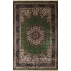 a green rug with an intricate design on the center and bottom, in various colors