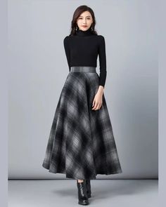 * A high-end long wool skirt, with wide elastic waist on back, very cool. * Made of wool blends, fully lined and with two side pockets. * Can custom make waist size and skirt length. * Material: Outer-50% wool, 50% polyester; lining-100% polyester * Washing instructions: Dry Clean Only * Size: True to US size, US 0-US 20 are available, you can let us know your usual size and height in your order. * Shipping: Free shipping Processing time : 5-7 Business days Delivery time : 7-20 Business days Tra Black Pleated Skirt For Winter, Black Flared Winter Skirt, Black Flared Skirt For Winter, Chic Full Maxi Skirt For Winter, Black Evening Skirt For Winter, Winter Midi Maxi Skirt In Relaxed Fit, Black Long Winter Skirt, Winter Black Wide Leg Skirt, Black Long Skirt For Winter