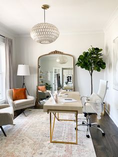 a living room filled with furniture and a large mirror