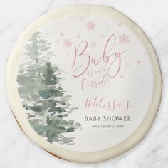 a baby is in the woods personalized christmas ornament on a marble surface