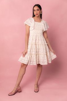 The Madison Dress features the prettiest subtle pink floral print, flutter sleeves, a smocked bodice, and a square neckline for a feminine and elegant look. These details provide a flattering and comfortable fit, making it a must-have for any spring wardrobe. Classy Easter Outfits, Pink Dresses Casual, Casual Easter Outfit, Kids White Dress, Ivy City Co, Lover Dress, Easter Dresses, White Bridal Dresses, Church Dress