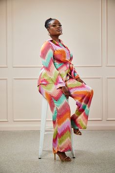 Two piece pants set with tie detail Spring Long Sleeve Matching Set Pantsuit, Multicolor Two-piece Pant Set For Spring, Chic Tie Waist Loungewear Sets, Chic Loungewear Sets With Tie Waist, Chic Multicolor Wide Leg Sets, Long Sleeve Loungewear Sets With Tie Waist, Chic Matching Pant Set For Fall, Chic Multicolor Matching Set, Multicolor Matching Pant Set For Spring