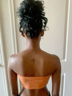 Tattoo Ideas Behind Neck, Baddie Tattoo Placement, Back On Neck Tattoo, Star Tattoos Spine, Tigrinya Tattoo, Bottom Neck Tattoo, Below Neck Tattoo, Star Tattoos Neck, Tattoo On The Back Of The Neck