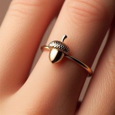 LITHIBITHI - TAMPA, FL - GOLD JEWELRY AND GIFTS ** Dainty Solid Yellow Gold Acorn Ring (also available in White and Rose Gold) ** Minimalist design featuring an adorable acorn on a 1.5mm wide band ** Perfect for everyday wear or as a thoughtful, nature-inspired gift ** Made with high-quality solid 10k gold (no plating or fillers) ** Beautifully packaged and gift-ready for any special occasion Includes one free resizing with purchase! (within 3 months) Acorn Ring, Squirrel Jewelry, Acorn Jewelry, Gold Schmuck, Jewelry Dainty, Ringe Gold, Gold Gift, Tampa Fl, Wide Bands