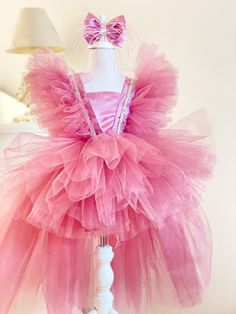 This Birthday Tulle Dress With Feather is prepared with great care for your birthday, photoshoots and parties. We can prepare this Girl Flower Tulle Dress in a different color ( red, pink, soft pink...) We have our own standard sizes for this item from 1 years to 12 years but ıf you want to order a custom size, you can message to us for the measurements ( height, weight, chest size, waist size, dress length on the knee from armpit ) We sew the dresses according to your measurements so please get Princess Style Ball Gown With Ruffles For Party, Princess Style Ruffled Evening Dress, Princess Style Ruffled Tutu Dress For Evening, Pink Princess Tutu Dress For Evening, Pink Ruffled Ball Gown For Birthday, Pink Ruffled Pageant Dress For Party, Fitted Ruffle Gown For Birthday, Pink Ball Gown Pageant Dress For Party, Fitted Ruffled Gown For Birthday