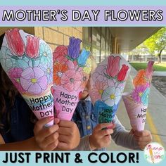 three girls holding flowers with the words mother's day flowers painted on them in pink and blue