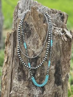 Embrace the timeless beauty of the Southwest with this stunning layered necklace featuring silver pearls and captivating turquoise beads. Each layer cascades gracefully, creating a unique and eye-catching statement piece. (20", 24", 30" long)  Faux silver and turquoise Silver Bohemian Beaded Necklaces For Layering, Blue Stacked Round Bead Jewelry, Navajo Pearls, Layer Necklace, Layered Necklace, Silver Pearls, Turquoise Beads, Western Wear, Layered Necklaces