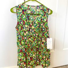 Blouse Style Fabric Tank Top By Cabi. New With Tags. Size S. Longer Style Fit With Elastic Around The Waist To Frame The Waist. Colors Are Lime Green, Red, Teal, Purple And Beige. Multicolor Sleeveless Blouse For Spring, Multicolor Sleeveless Blouse For The Beach, Multicolor Sleeveless Blouse For Day Out, Multicolor Sleeveless Casual Blouse, Multicolor Sleeveless Blouse For Beach, Multicolor Rayon Tops For Day Out, Green Vibrant Print Tops For Vacation, Casual Sleeveless Multicolor Blouse, Casual Multicolor Sleeveless Blouse